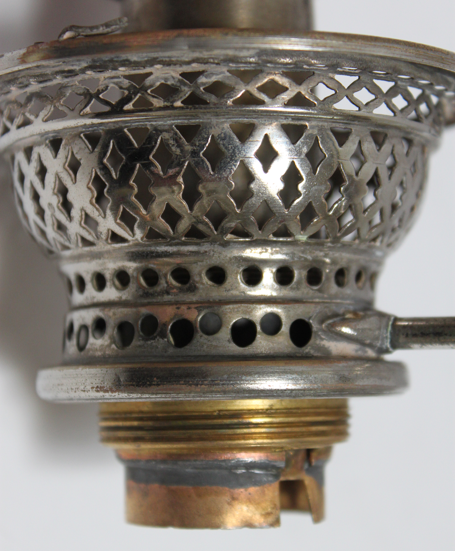 Lower side view of Ironclad lamp burner basket
